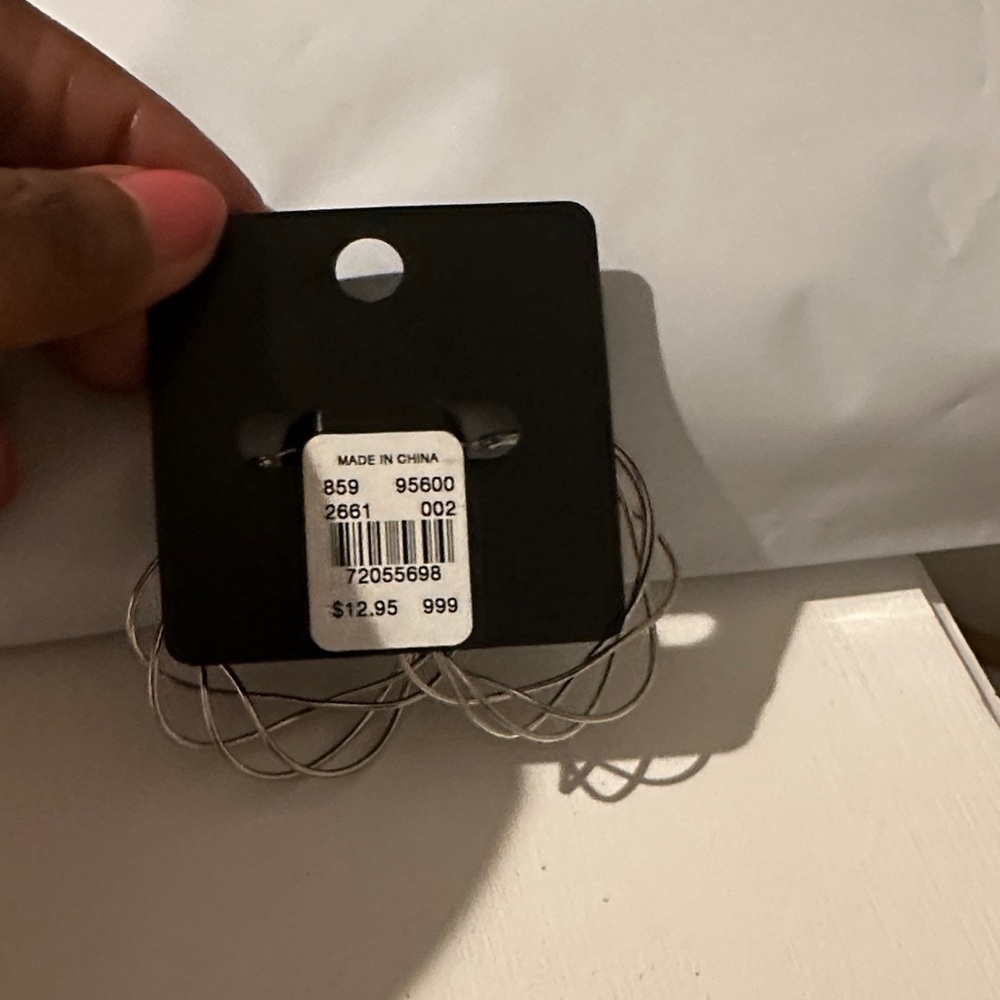 New York & Company Twisted Silver Hoop Earrings - Picture 4 of 5
